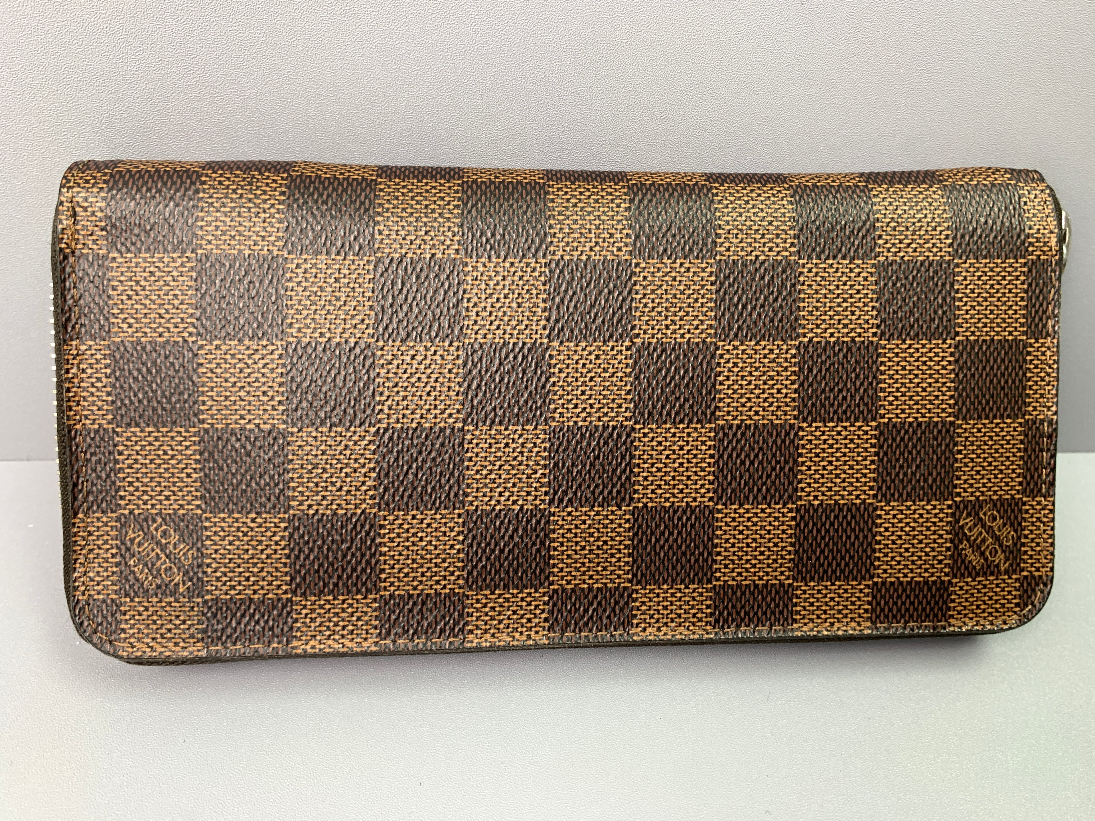 Pre-Owned Louis Vuitton Damier Ebene Zippy Wallet 40737581